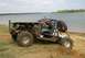 Buggy getting over berm